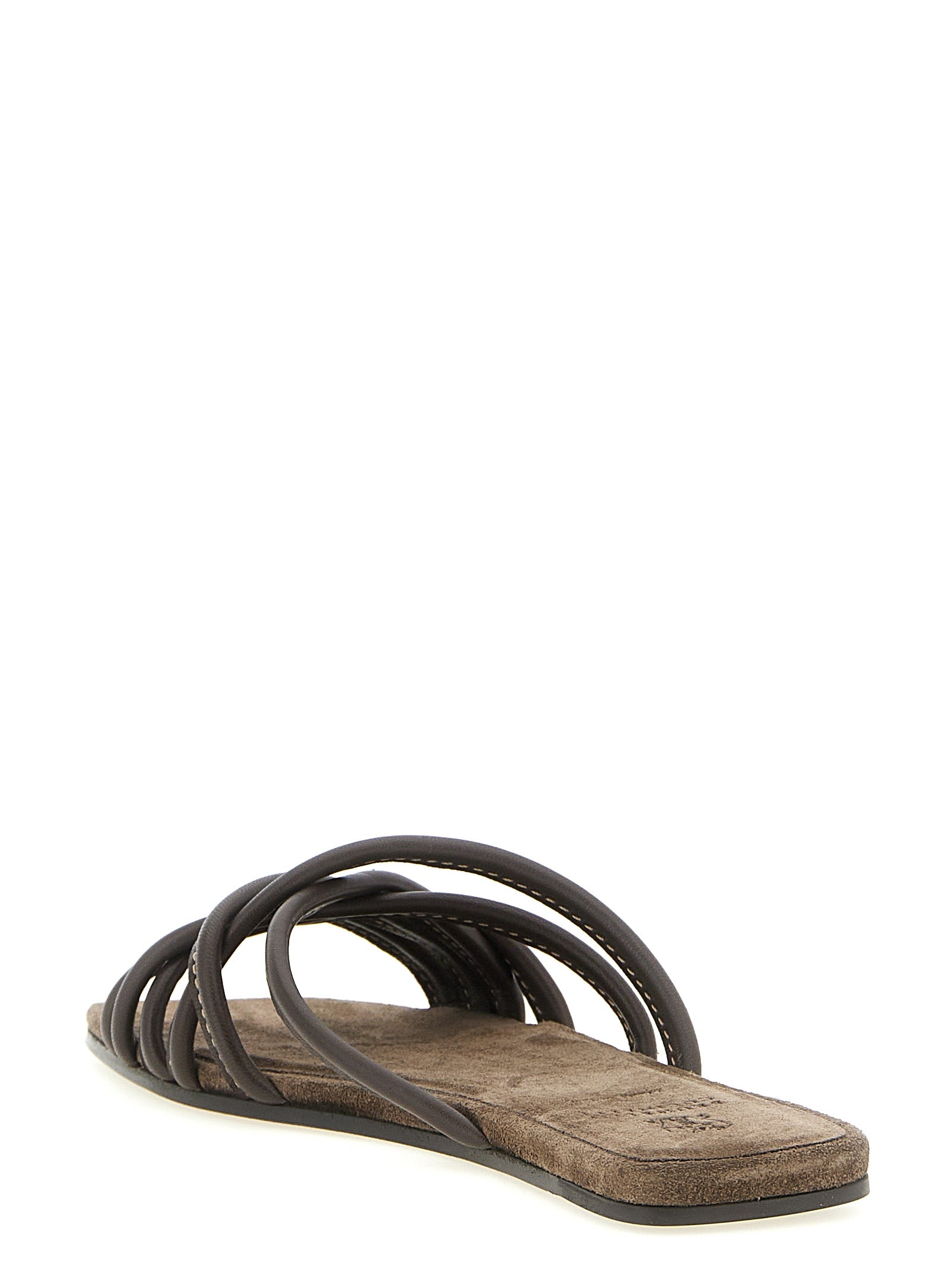 Sliders Flat Shoes by Brunello Cucinelli for women in suede lamb leather brown showcases a dynamic silhouette, artfully capturing Women's Suede Lamb Leather Sliders Flat Shoes through its distinctive and elegant .