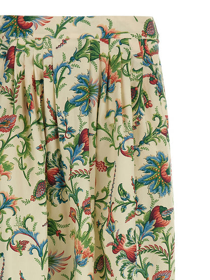 Skirt by Etro for women in cotton multicolor, patterned & floral showcases a sultry silhouette, elegantly defined by its mini and the sophisticated sultry design of the Women's Pleated High Rise Cotton Mini Skirt.