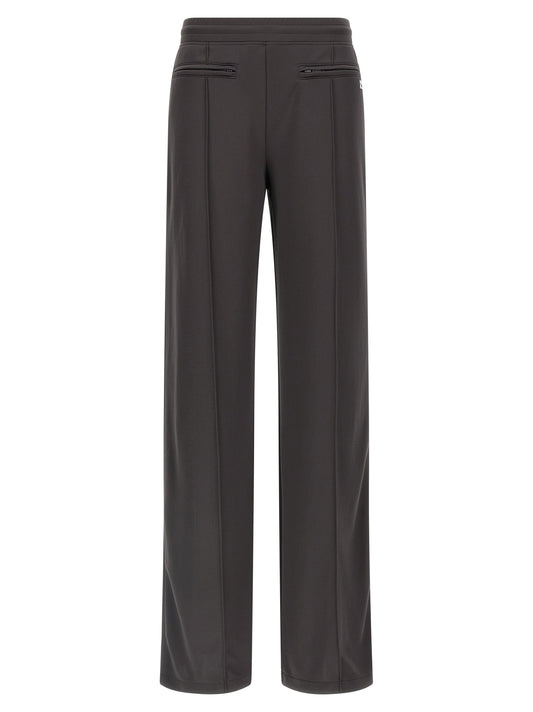 Joggers by Courrèges for women in polyester gray features an refined tailoring silhouette, showcasing a premium flared & wide with a and long cut for a refined tailoring look.