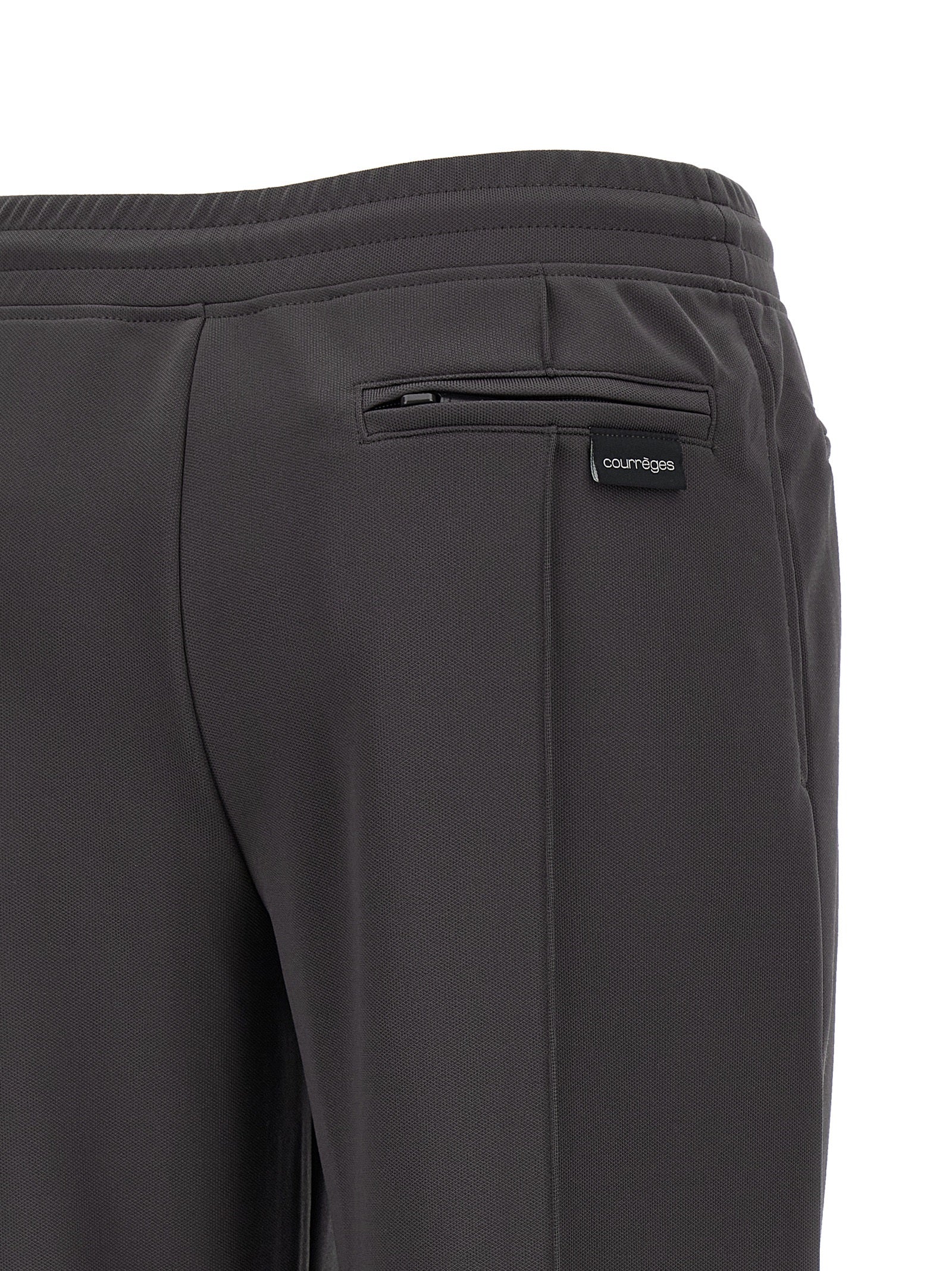 Joggers by Courrèges for women in polyester gray features an refined tailoring silhouette, showcasing a premium flared & wide with a and long cut for a refined tailoring look.
