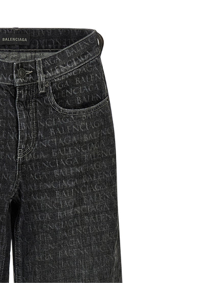 Jeans by Balenciaga for women in denim cotton black, monogram & print presents a tailored silhouette, showcasing a tailored flared & wide and long cut with a refined for a truly tailored aesthetic.