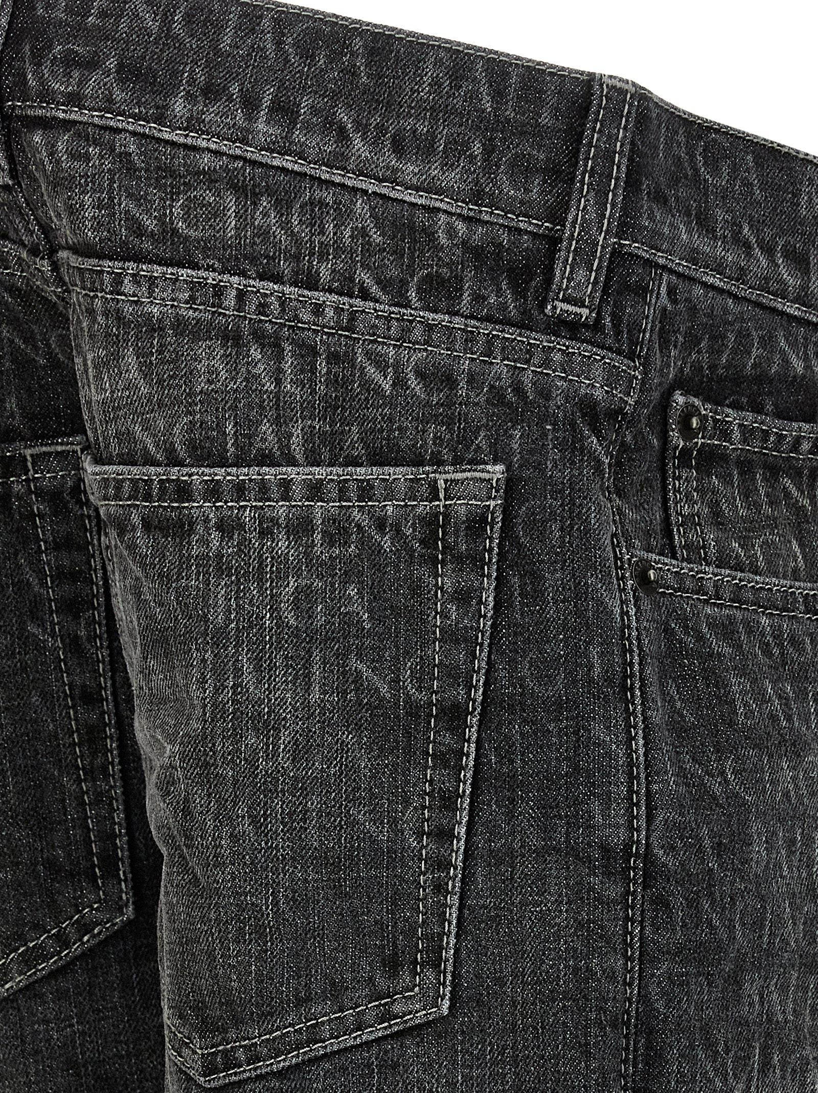 Jeans by Balenciaga for women in denim cotton black, monogram & print presents a refined pantology silhouette, artfully defined by a refined pantology flared & wide, long, and a sophisticated .