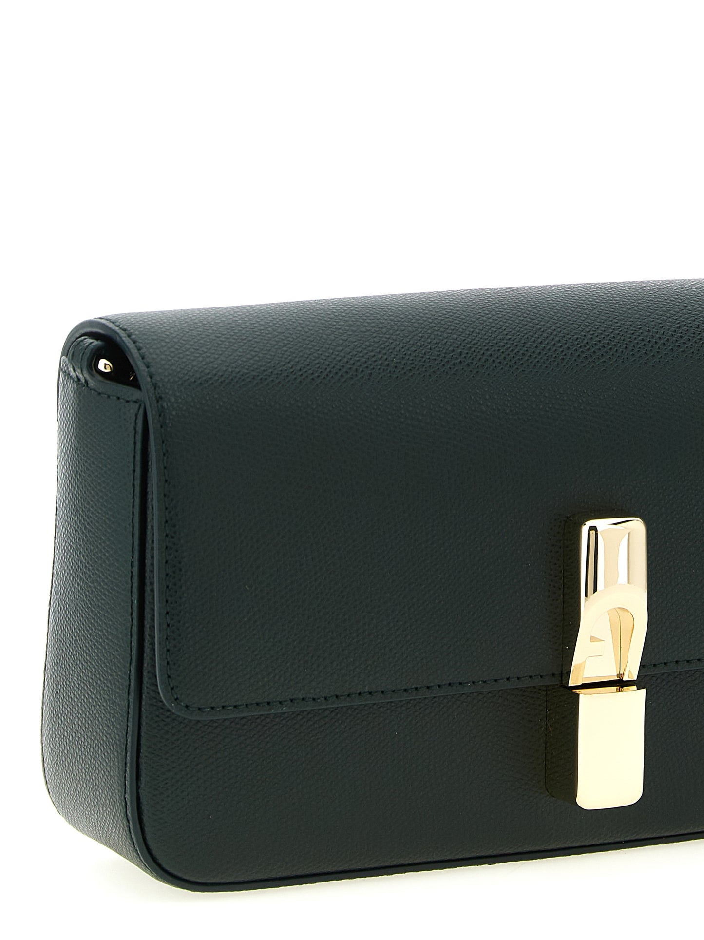 Small Crossbody Flap Handbag by Furla for women in calfskin leather bicolour & green features a versatile chic silhouette, meticulously detailed with a secure flap & magnetic, ample , and versatile crossbody-strap, shoulder-strap & adjustable-strap.