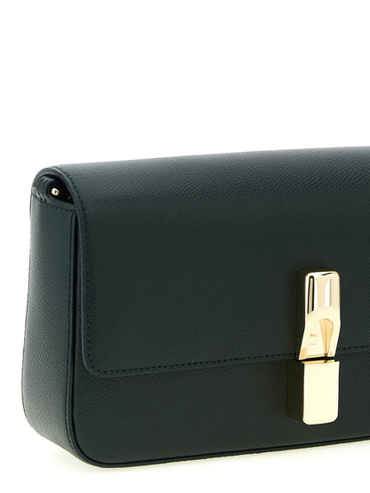 Small Crossbody Flap Handbag by Furla for women in calfskin leather bicolour & green features a versatile chic silhouette, meticulously detailed with a secure flap & magnetic, ample , and versatile crossbody-strap, shoulder-strap & adjustable-strap.