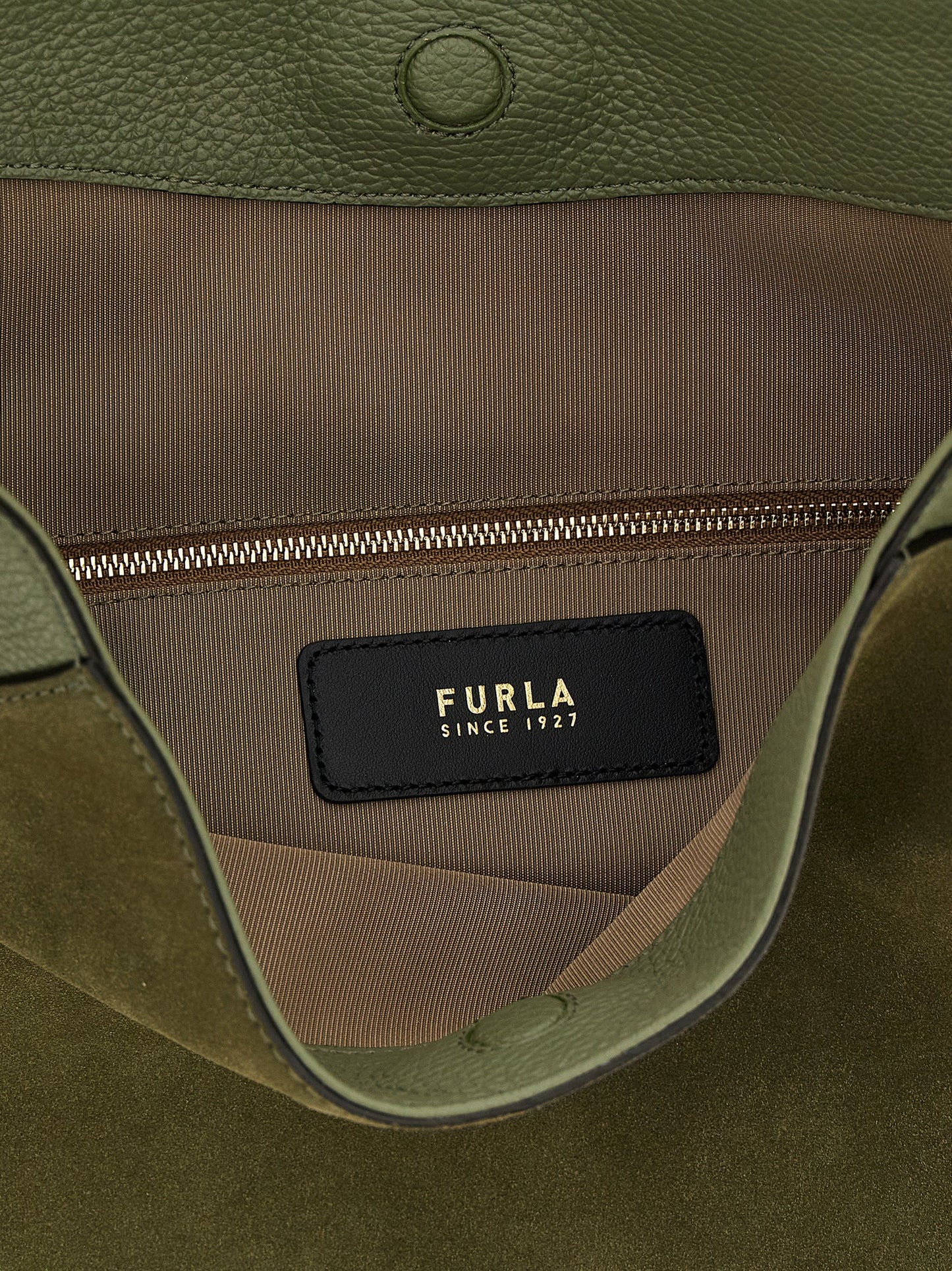 Large Shoulder Bag by Furla for women in calfskin leather bicolour & green features a stately silhouette, showcasing a secure magnetic, ample , and stately shoulder-strap & handle for a stately finish.