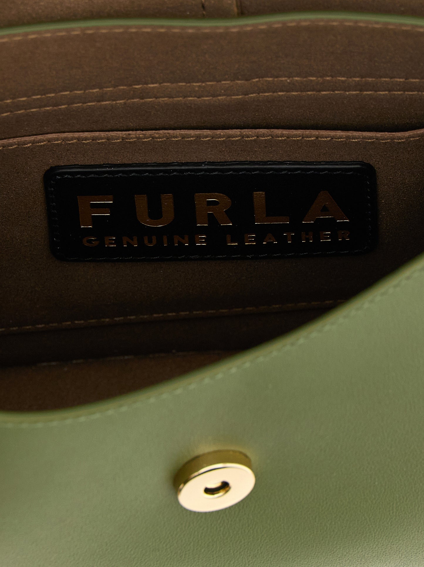 Shoulder Flap Bag by Furla for women in calfskin leather bicolour & green presents a statuesque silhouette, showcasing a secure flap and statuesque with versatile shoulder-strap, adjustable-strap & handle for a sophisticated look.
