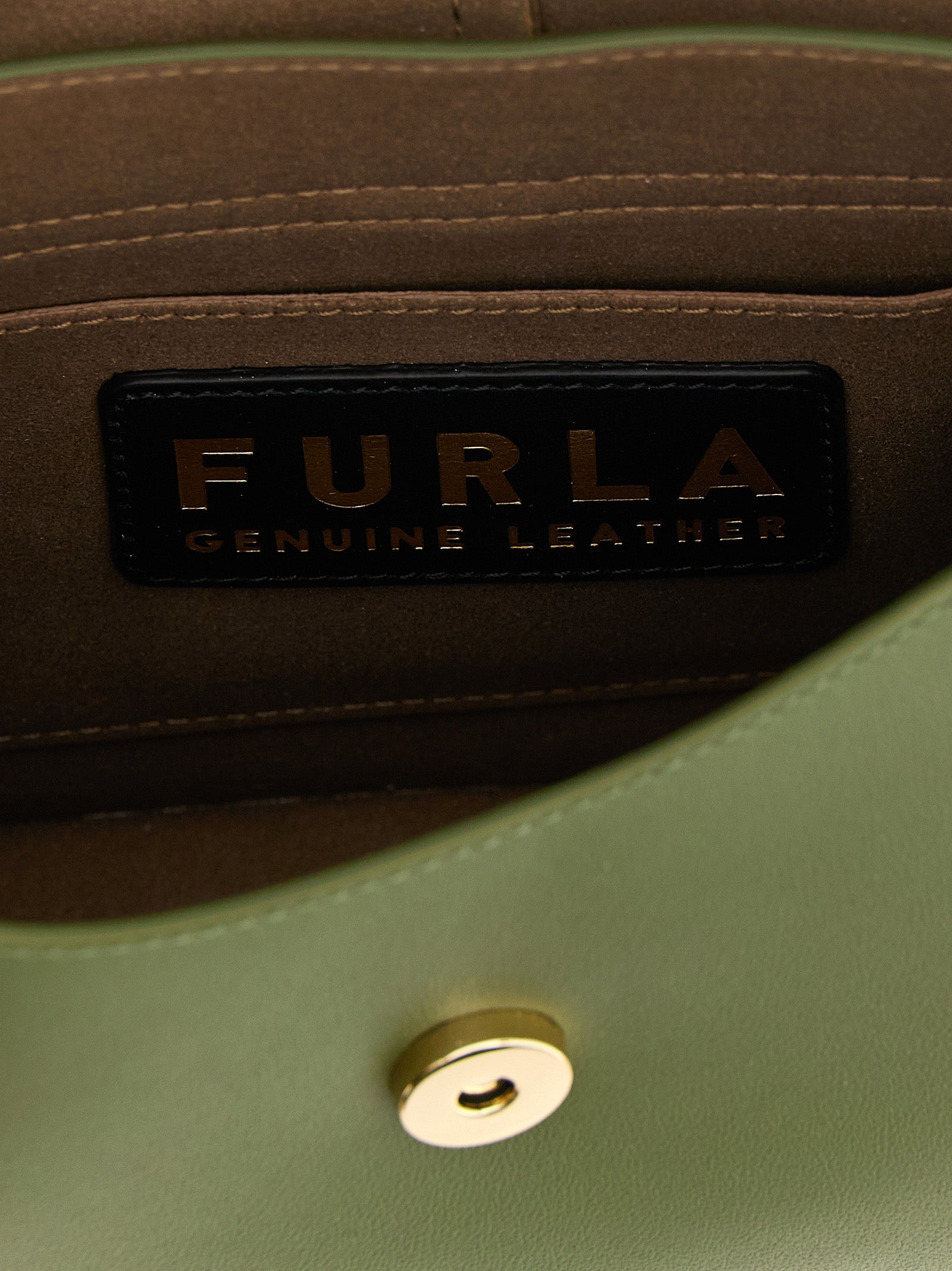 Shoulder Flap Bag by Furla for women in calfskin leather bicolour & green presents a statuesque silhouette, showcasing a secure flap and statuesque with versatile shoulder-strap, adjustable-strap & handle for a sophisticated look.