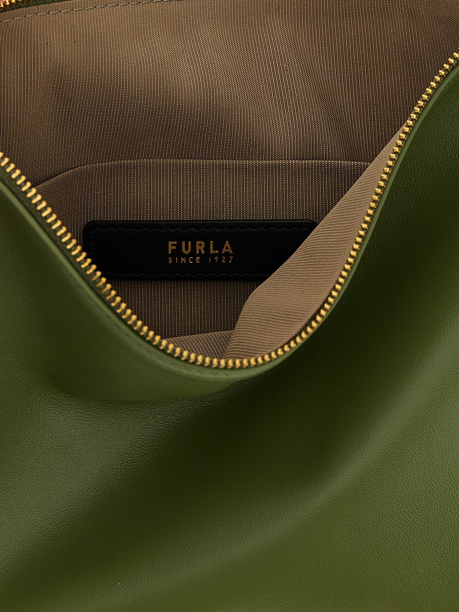 Mini Shoulder Bag by Furla for women in pu leather bicolour & green features a effortless chic silhouette with a secure zipper, ample , and versatile shoulder-strap & adjustable-strap for a effortless chic finish.