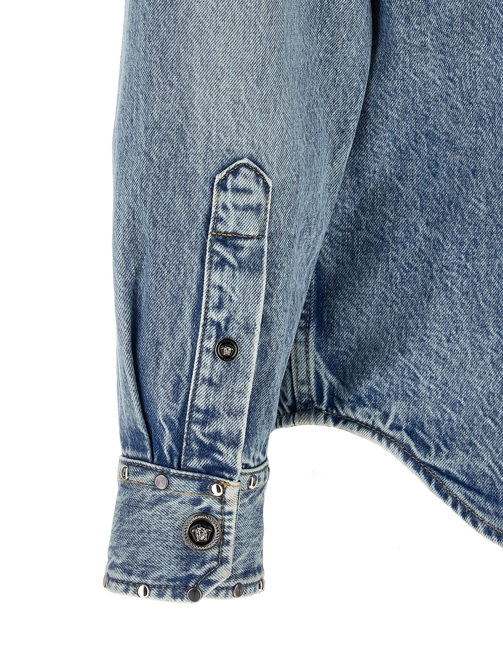 Shirt by Versace for men in denim cotton light-blue showcases a sleek silhouette, elegantly detailed with a sleek and for a sleek finish.