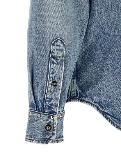 Shirt by Versace for men in denim cotton light-blue showcases a sleek silhouette, elegantly detailed with a sleek and for a sleek finish.