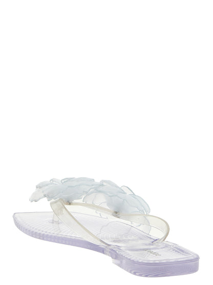 Flip-Flops Sliders Sandals Flat Shoes by Coperni for women in pvc transparent features an captivating silhouette, showcasing the captivating style of the Women's PVC Flip-Flops Sliders Sandals Flat Shoes with its distinct and refined .