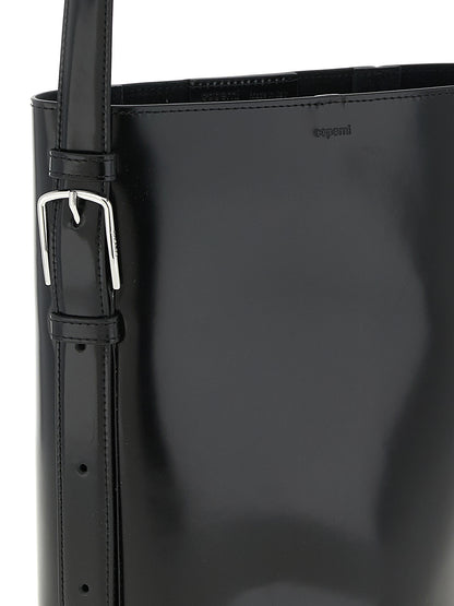 Shoulder Bucket Bag by Coperni for women in bos taurus calf suede leather black features a statuesque silhouette, showcasing a secure and statuesque with versatile shoulder-strap, adjustable-strap & handle for a statuesque finish.