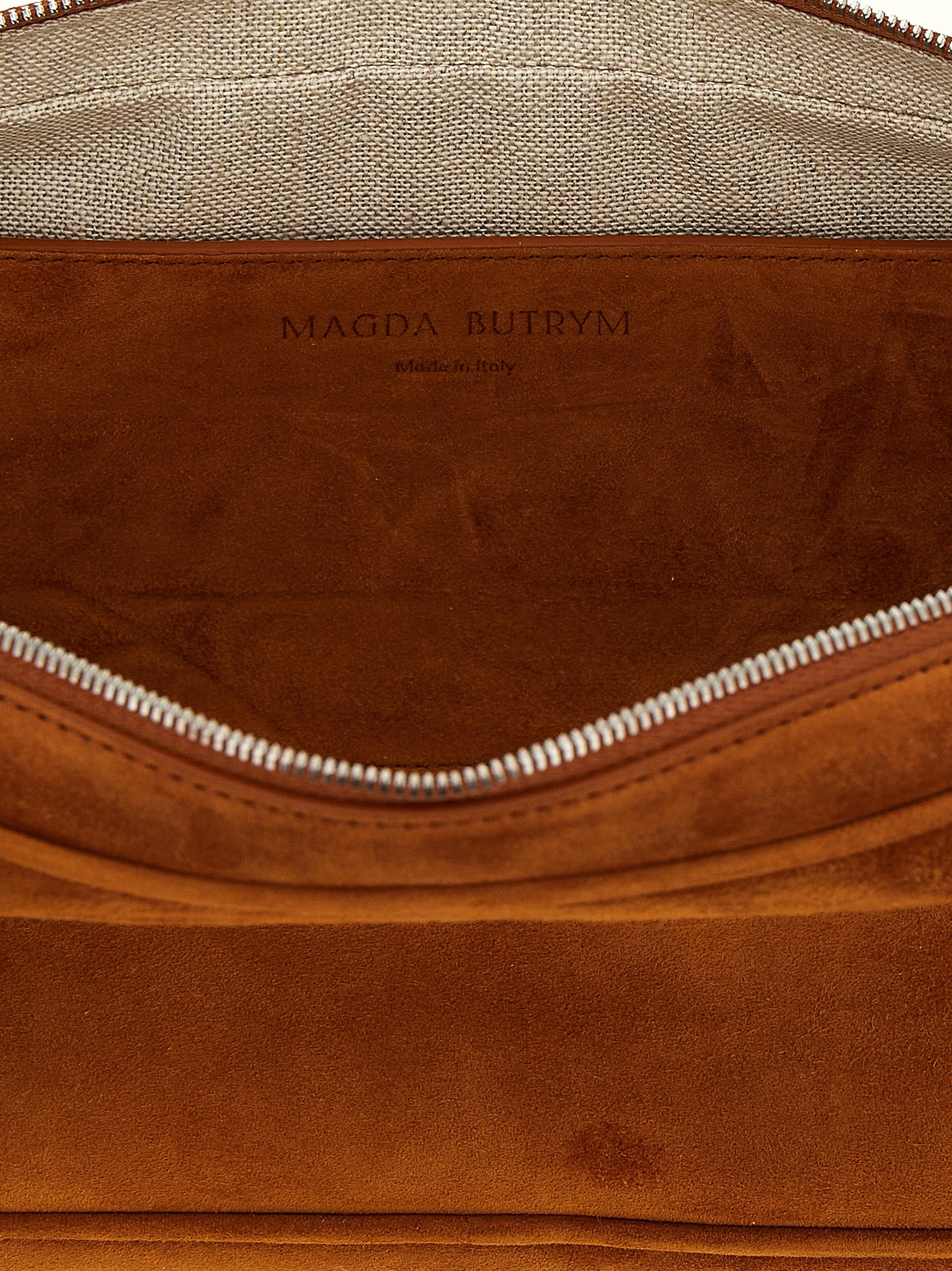 Shoulder Trapeze Bag by Magda Butrym for women in suede calfskin leather brown, rose & signature showcases a enviable silhouette, artfully detailed with a secure zipper, organized , and versatile shoulder-strap & handle for a enviable look.