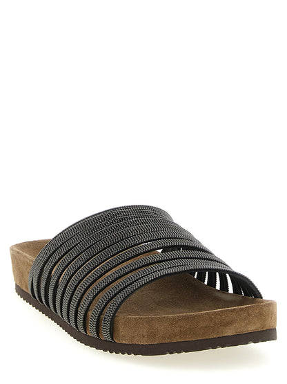 Sliders Flat Shoes by Brunello Cucinelli for women in tu & suede lamb leather black presents a effortless chic silhouette, showcasing the Monile Women's TU & Suede Lamb Leather Sliders Flat Shoes design with a effortless chic and for a sophisticated look.
