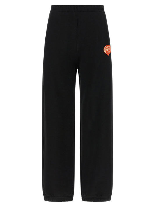 Joggers by Kenzo for women in cotton black presents a tailored silhouette, showcasing a tailored straight-leg and long cut with a refined for a truly tailored aesthetic.