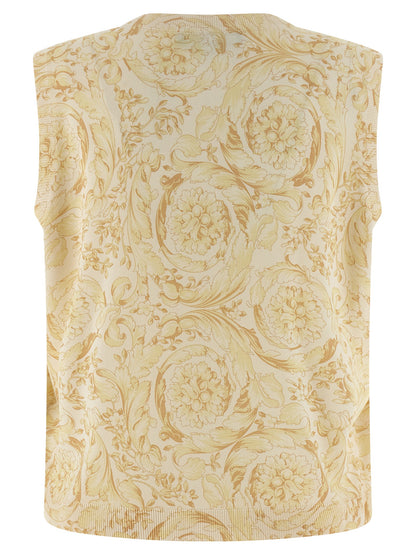 Vest by Versace for women in silk bicolour, yellow, patterned & print features a enviable silhouette, elegantly detailed with a enviable and functional for a enviable finish.