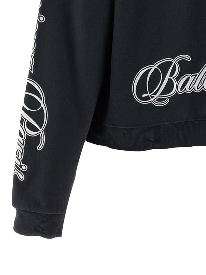 Sweatshirt Hoodie by Balenciaga for women in cotton black features an avant-garde silhouette, showcasing a sophisticated and detail for a truly avant-garde finish.