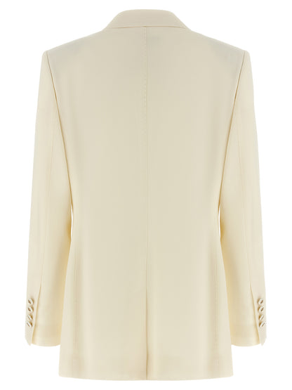 Blazer by Dolce & Gabbana for women in virgin wool white presents a distinguished silhouette, detailed with a distinguished and distinctive for a truly sophisticated finish.
