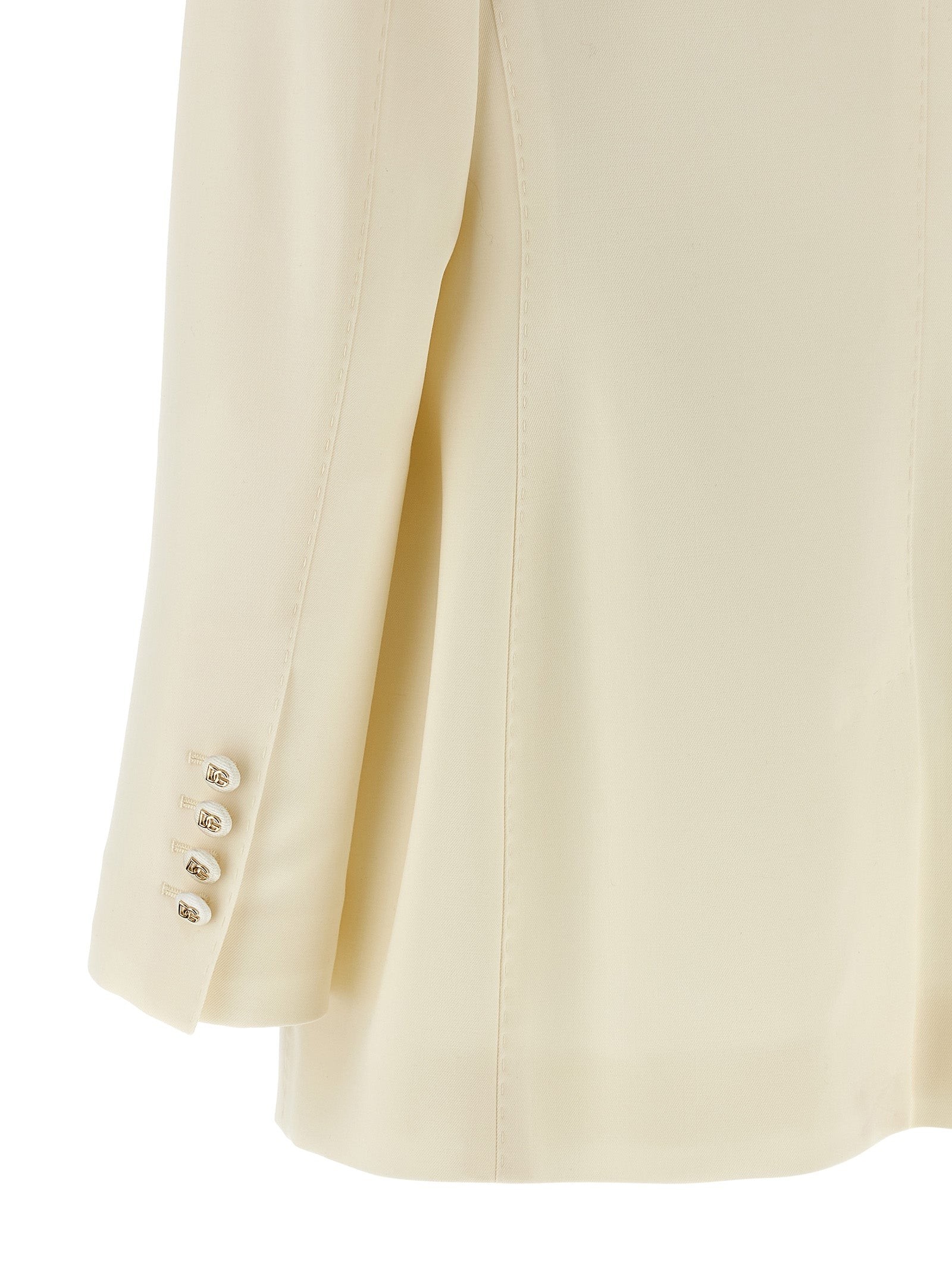 Blazer by Dolce & Gabbana for women in virgin wool white presents a distinguished silhouette, detailed with a distinguished and distinctive for a truly sophisticated finish.