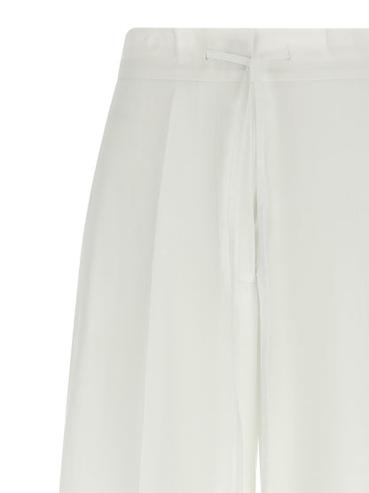 Trousers by P.A.R.O.S.H. for women in cotton white features a artisanal silhouette, showcasing a sophisticated straight-leg & wide with a long and for a artisanal finish.