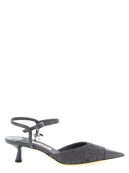 Mid-Heel Ankle Strap Slingback Pumps Heels by Jimmy Choo for women in patent leather gray & pearl features a effortless chic silhouette, showcasing the Women's Patent Leather Mid-Heel Ankle Strap Slingback Pumps Heels design with a effortless chic mid-heel and pointed toe style for a effortless chic finish.