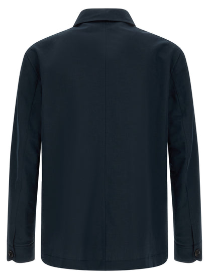 Overcoat by Brioni for men in linen cotton & leather blue features an voluminous silhouette, showcasing distinct pockets and a voluminous square shirt-collar neckline for a truly voluminous aesthetic.