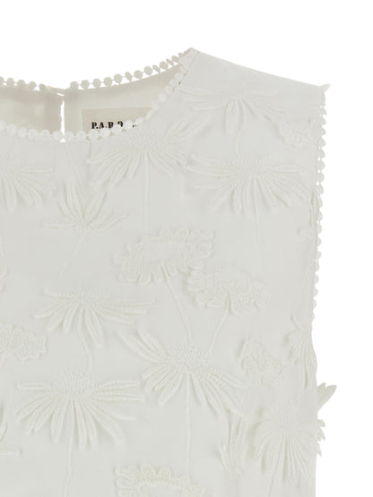 Blouse by P.A.R.O.S.H. for women in cotton white & floral showcases a sharp silhouette, elegantly detailed with a sharp round neckline and sharp .