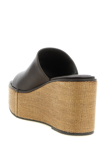 Wedge Sandals by Brunello Cucinelli for women in raffia & calfskin leather brown features an statuesque Essence Heart Women's Raffia & Calfskin Leather Wedge Sandals silhouette with a refined wedge and elegant .