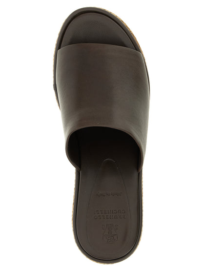 Wedge Sandals by Brunello Cucinelli for women in raffia & calfskin leather brown features an exquisite silhouette, showcasing the exquisite Essence Heart Women's Raffia & Calfskin Leather Wedge Sandals with a wedge and .