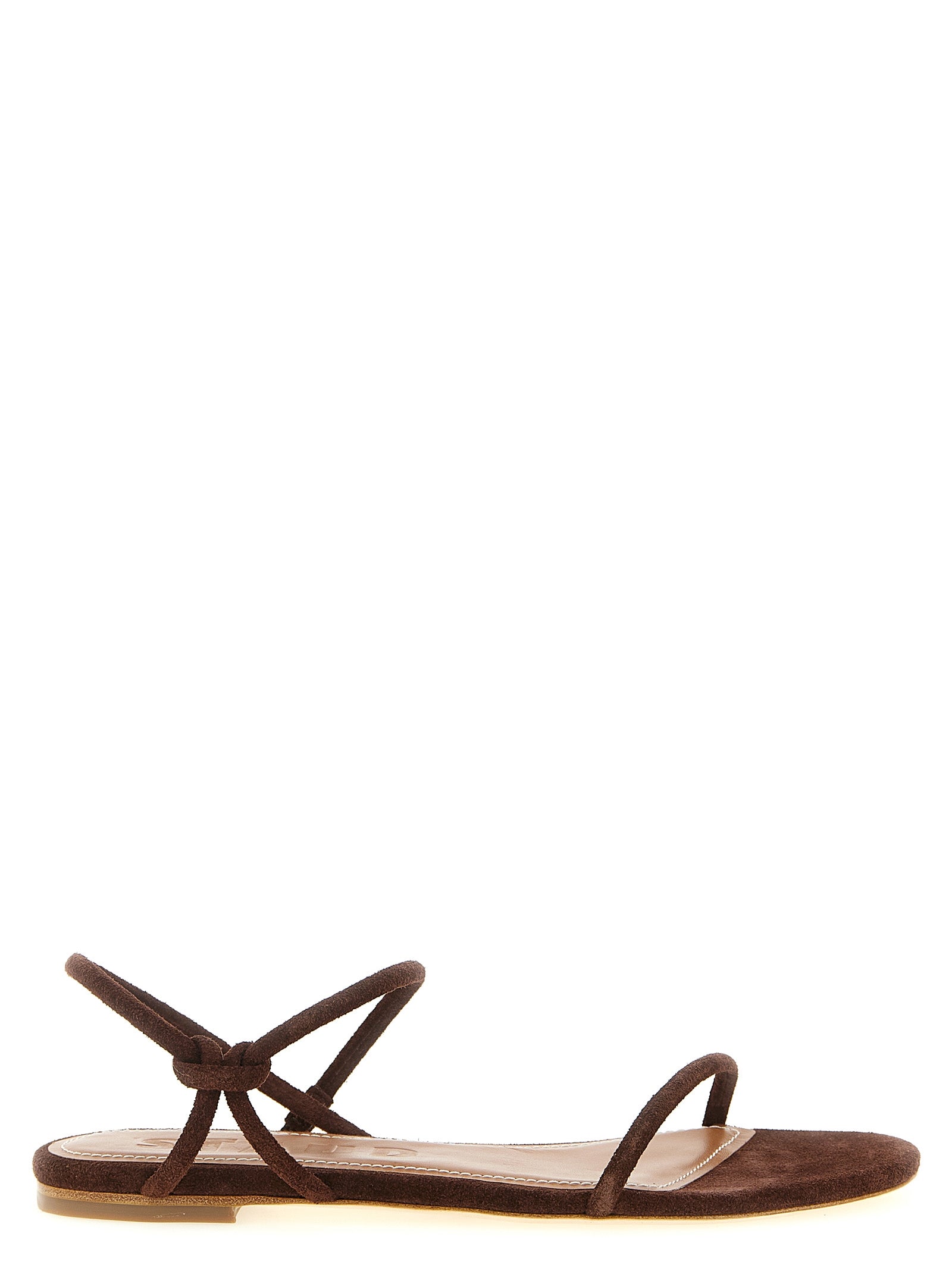 Flat Sandals by Staud for women in bos taurus suede cowhide leather brown presents a sculptural silhouette, showcasing the Laurel Women's Bos Taurus Suede Cowhide Leather Flat Sandals design with a sculptural flat and for a premium look.