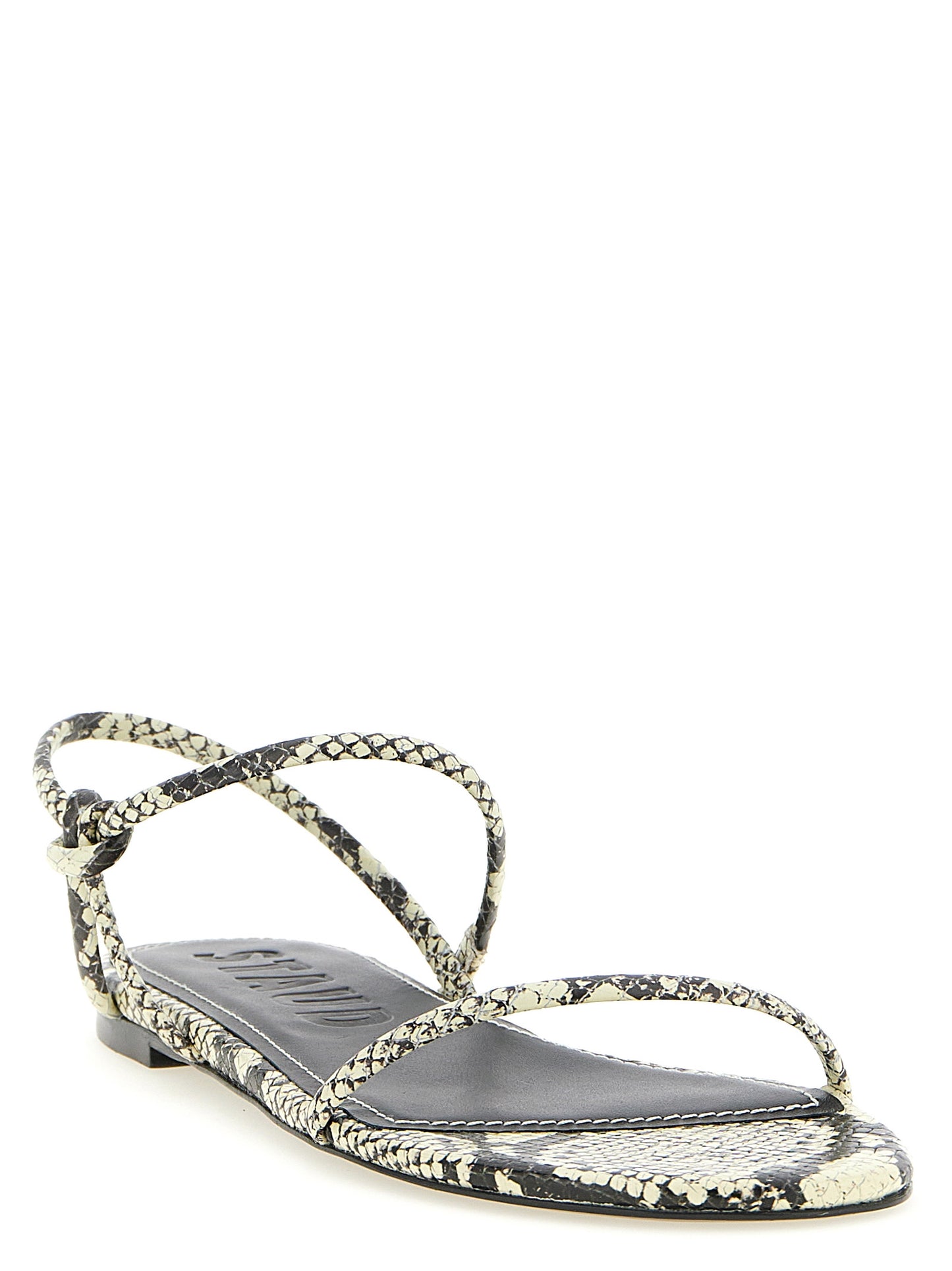 Flat Sandals by Staud for women in bos taurus cowhide python leather and bicolour, black, white & print presents a captivating silhouette, showcasing the signature style of the Laurel Women's Bos Taurus Cowhide Python Leather Flat Sandals with a captivating flat and captivating .