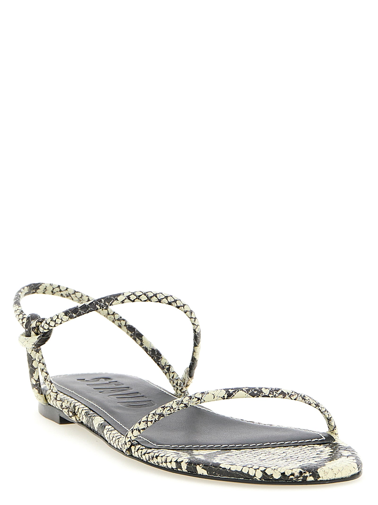 Flat Sandals by Staud for women in bos taurus cowhide python leather and bicolour, black, white & print presents a captivating silhouette, showcasing the signature style of the Laurel Women's Bos Taurus Cowhide Python Leather Flat Sandals with a captivating flat and captivating .