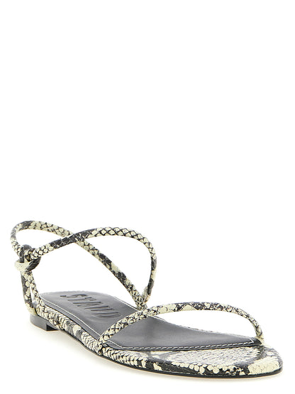 Flat Sandals by Staud for women in bos taurus cowhide python leather and bicolour, black, white & print presents a captivating silhouette, showcasing the signature style of the Laurel Women's Bos Taurus Cowhide Python Leather Flat Sandals with a captivating flat and captivating .