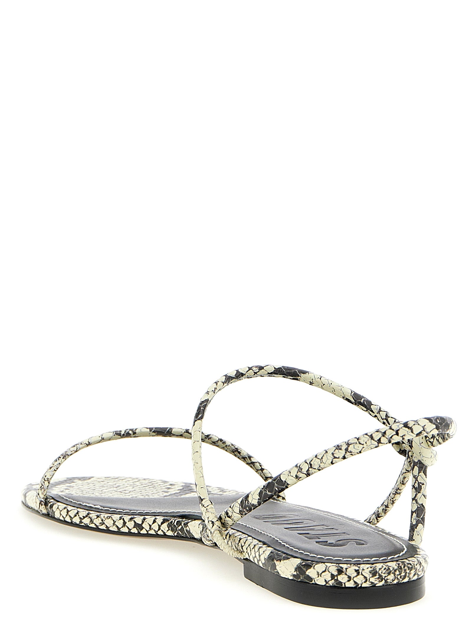 Flat Sandals by Staud for women in bos taurus cowhide python leather bicolour, black, white & print features an architectural design from the Laurel Women's Bos Taurus Cowhide Python Leather Flat Sandals collection, defined by a architectural flat and for a architectural finish.