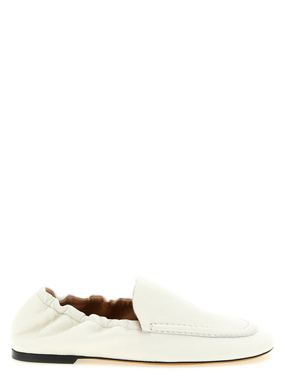 Flat Loafer Slip-On Shoes by ODISSI for women in lamb leather white showcases a impeccable silhouette as Grace Siena Women's Lamb Leather Flat Loafer Slip-On Shoes, artfully designed with a impeccable flat and refined for a impeccable finish.