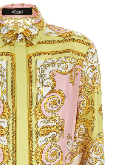 Dress by Versace for women in silk twill multicolor & print presents a sinuous silhouette, showcasing a sophisticated and detailed with a sinuous short mini for a refined finish.