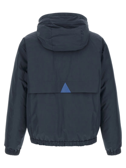 Hooded Windbreaker Jacket by Moncler Grenoble for men in polyamide goose-down & cotton blue showcases a urban chic silhouette, detailed with a urban chic hooded neckline and functional hooded, insulated & windproof for a polished finish.