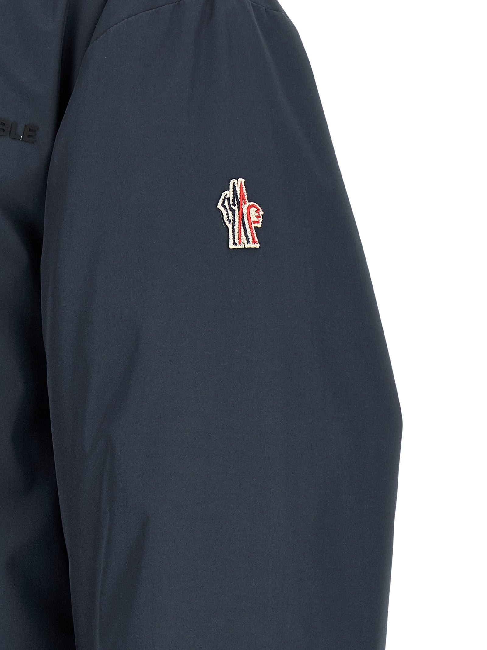 Hooded Windbreaker Jacket by Moncler Grenoble for men in polyamide goose-down & cotton blue showcases a modern silhouette, integrating hooded, insulated & windproof and a modern hooded neckline for a sophisticated finish.