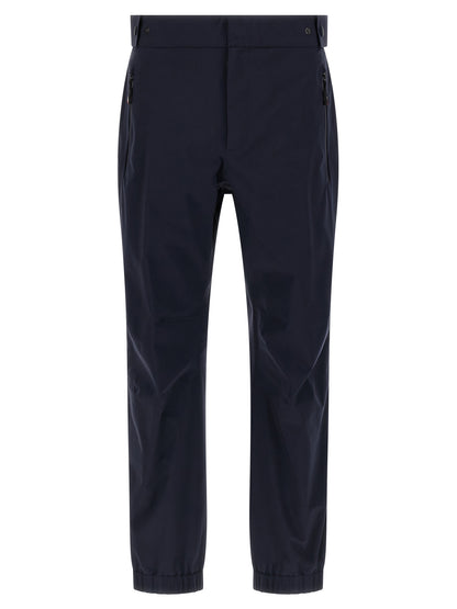 Joggers by Moncler Grenoble for men in polyamide blue features an sophisticated and with a precise long, creating a sophisticated and sophisticated silhouette.