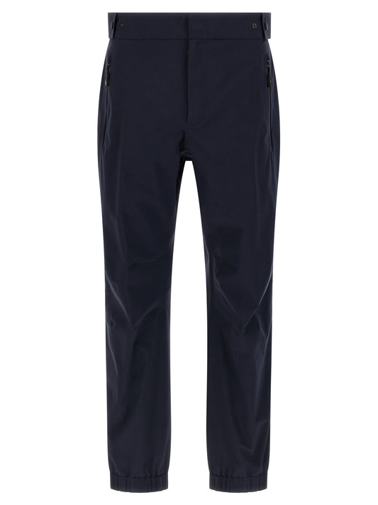 Joggers by Moncler Grenoble for men in polyamide blue features an sophisticated and with a precise long, creating a sophisticated and sophisticated silhouette.