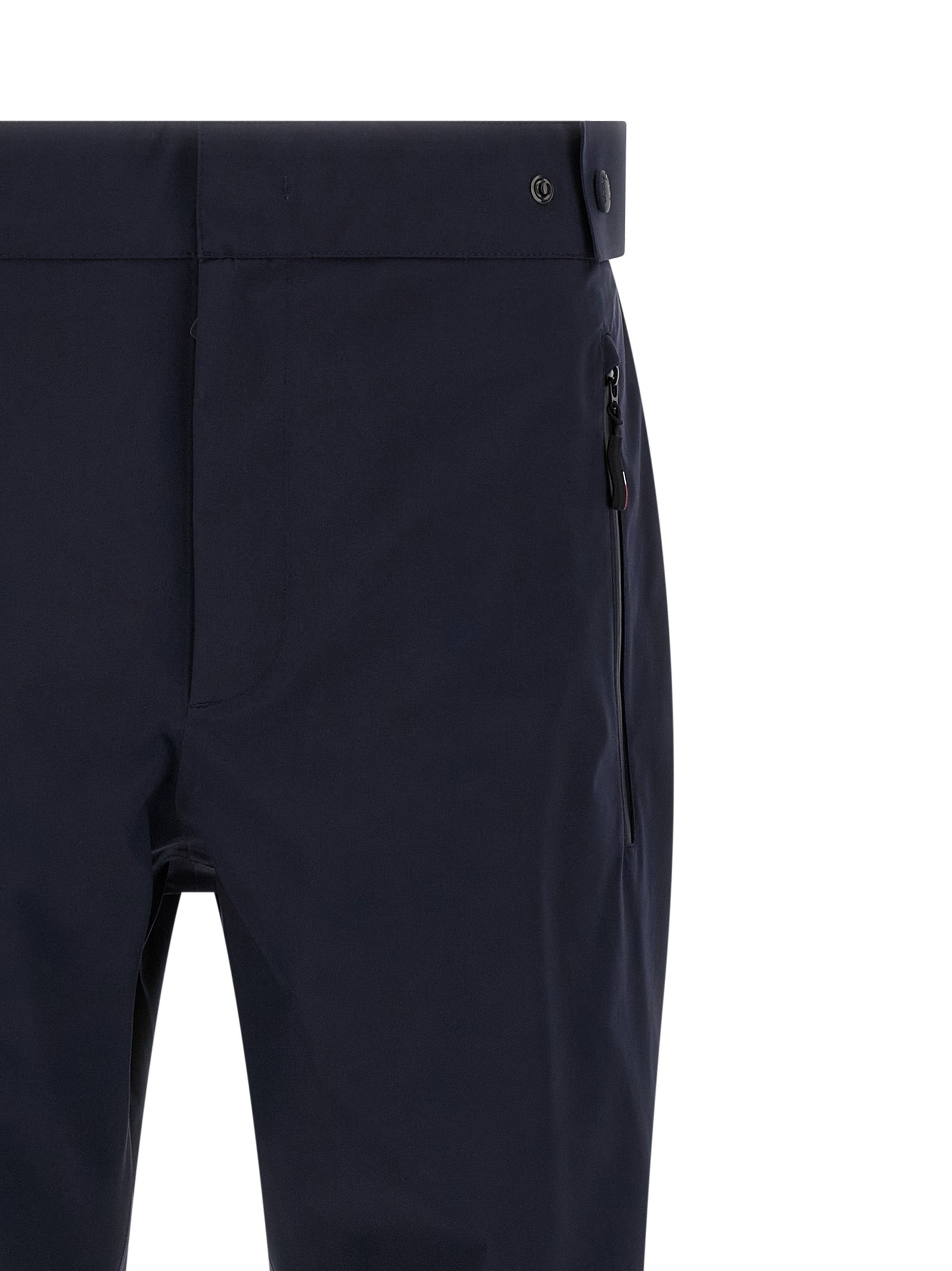 Joggers by Moncler Grenoble for men in polyamide blue presents a refined pantology silhouette, artfully defined by a refined pantology , long, and a sophisticated .