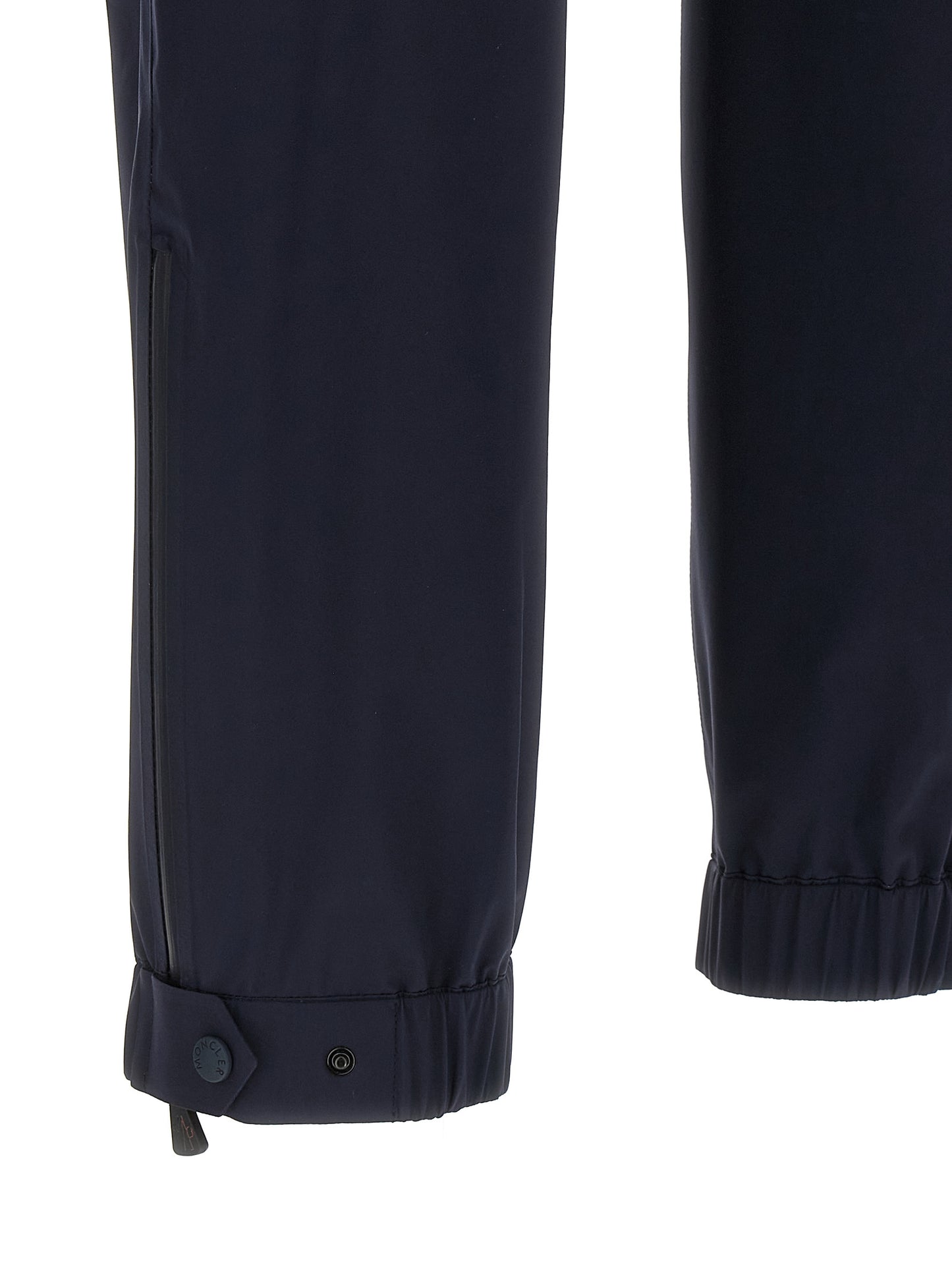 Joggers by Moncler Grenoble for men in polyamide blue features an sartorial and long with a cut for a sartorial finish.