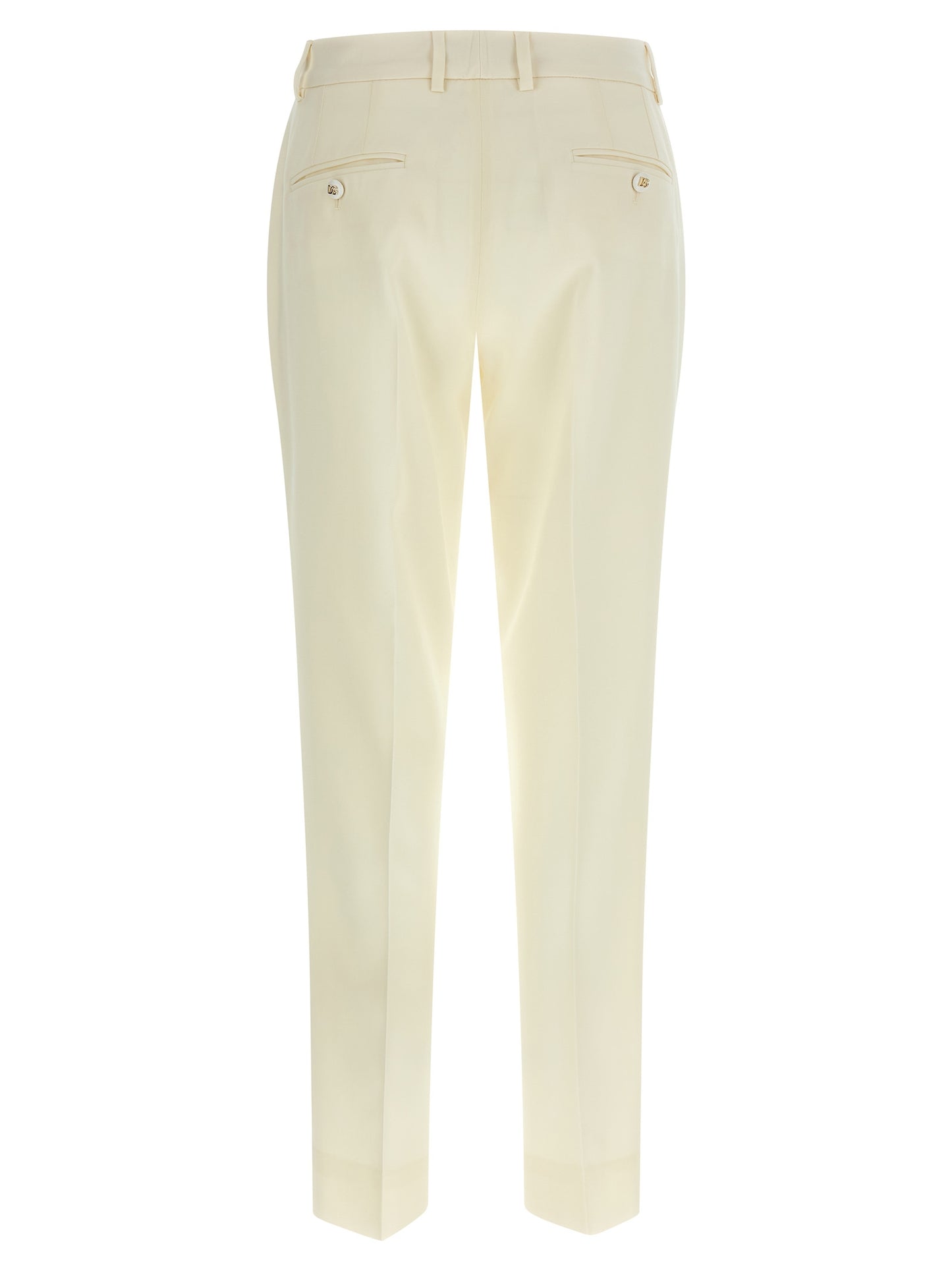 Trousers by Dolce & Gabbana for women in virgin wool white features a tailored silhouette with a tailored straight-leg, defined by its long and a sophisticated .