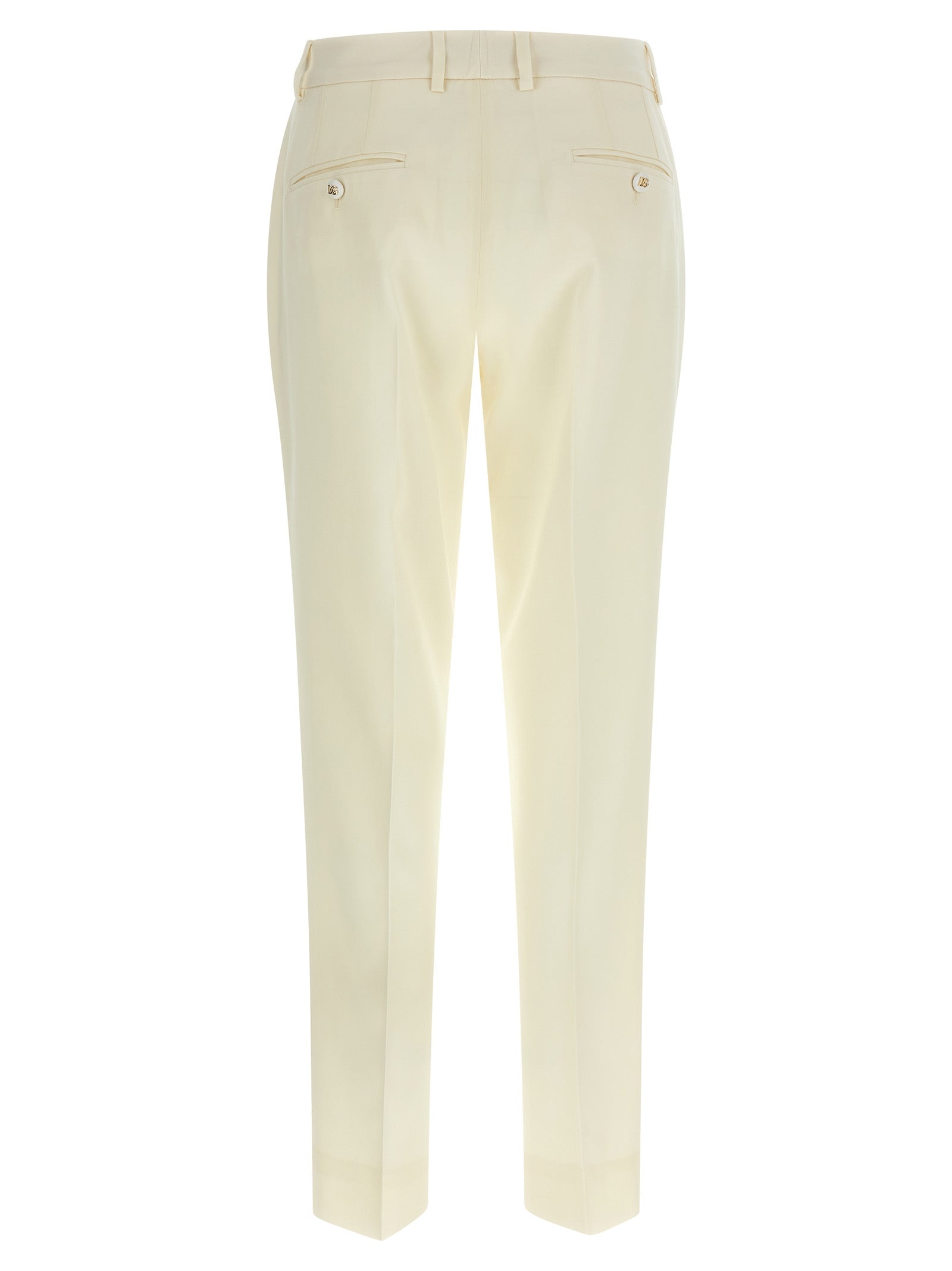 Trousers by Dolce & Gabbana for women in virgin wool white features a tailored silhouette with a tailored straight-leg, defined by its long and a sophisticated .