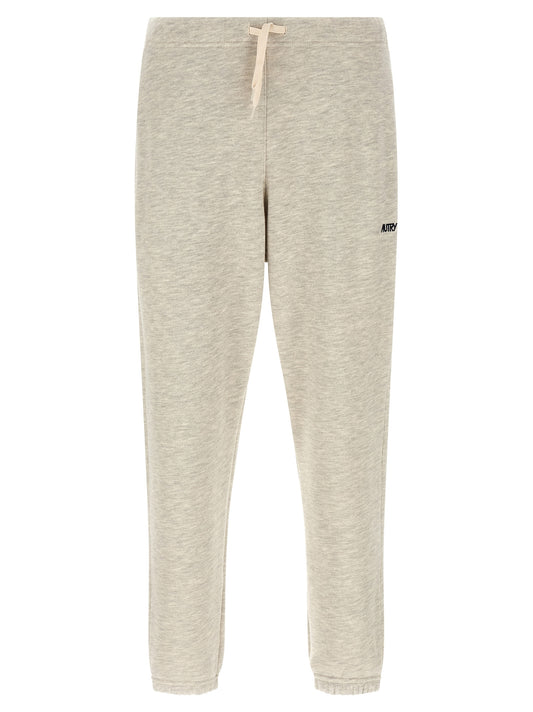 Joggers by Autry for men in cotton polyester gray presents a refined pantology silhouette, artfully defined by a refined pantology straight-leg, long, and a sophisticated .