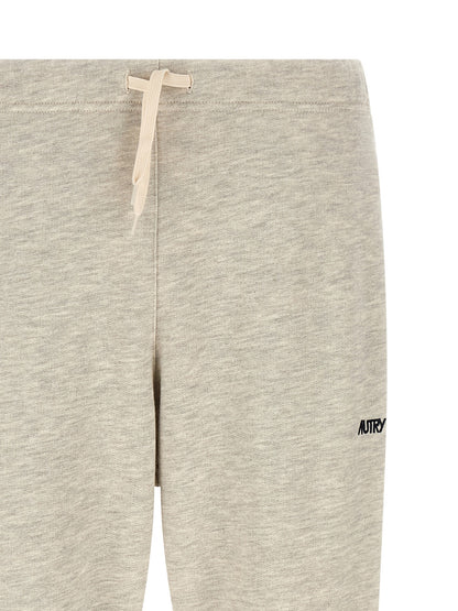 Joggers by Autry for men in cotton polyester gray features an refined tailoring silhouette, showcasing a premium straight-leg with a and long cut for a refined tailoring look.