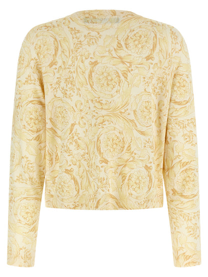 Cardigan by Versace for women in silk bicolour, yellow & print showcases a captivating silhouette, artfully detailed with a captivating and crew neckline for a truly sophisticated captivating look.
