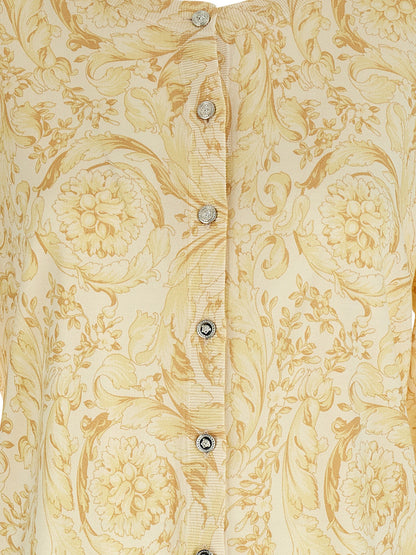 Cardigan by Versace for women in silk bicolour, yellow & print features a nuanced silhouette with a refined and nuanced detailing for a sophisticated look.