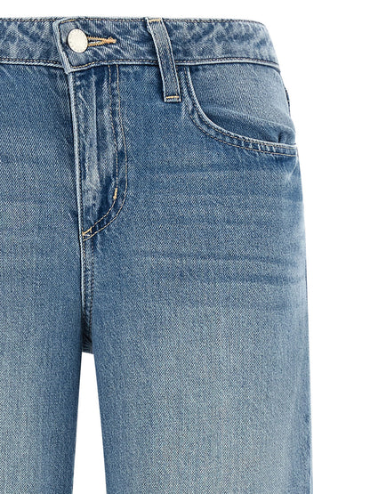 Jeans by L'Agence for women in denim cotton blue presents a tailored silhouette, showcasing a tailored straight-leg & wide and long cut with a refined low rise for a truly tailored aesthetic.