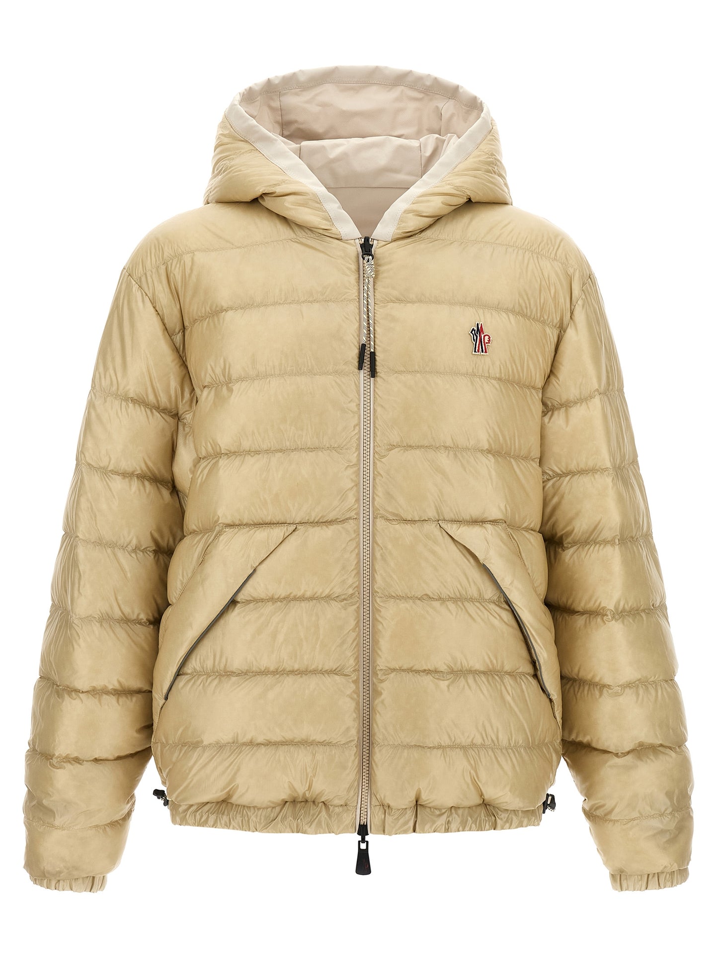 Hooded Puffer Jacket by Moncler Grenoble for men in nylon beige showcases a bohemian silhouette, artfully detailed with a bohemian hooded neckline and signature hooded, insulated & windproof for a truly bohemian finish.